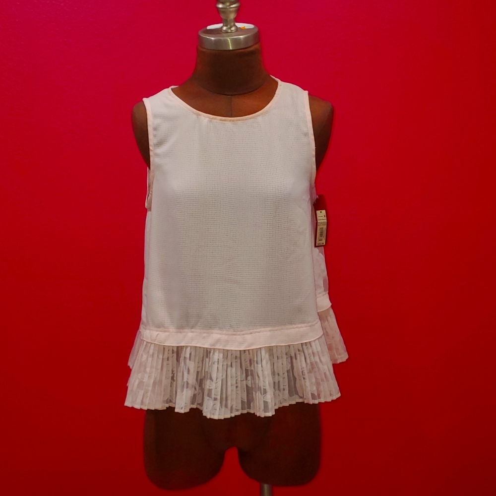 Light pink top with sheer pleated bottom